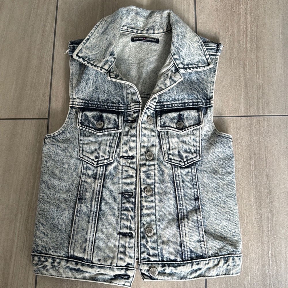 Denim Sleeveless Vest. One size but I would say it fits an can